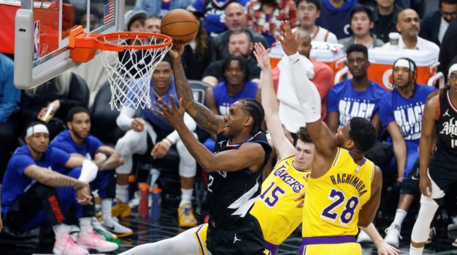 NBA常规赛猛龙队击败老鹰队